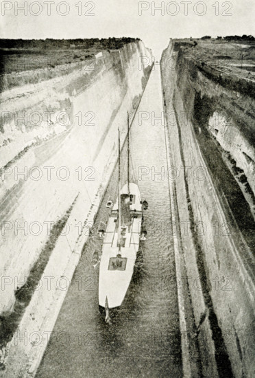 The 1912 caption reads: ""Canal that Nero Dreamed of - This is one of the wonderful canals which helped to shorten the journey around the world. It is the Corinth Canal, cut through the Isthmus of Corinth, and it enables ships to go to Athens and then on through the blue Aegean Sea to Constantinople without having to sail round the rocky coast of Morea, in the south of Greece. When the Roman emperor Nero was young and energetic, he caused this canal to be be begun, but the work was put off and never resumed until our own time. It is 3.2 miles long, and was cut through limestone rock in one part 250 feet above the level of the sea. The canal is 100 feet wide and 26 feet deep, and jit saves ships 200 miles, Sailing through it from Greece, the traveler comes out in full view of the city where Paul made tents."" Under Nero, the canal was begun in 67 AD, but he was assassinated and work stopped. In 1881, the Greeks began construction and first shipped passed.