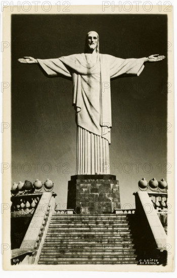 This 1930s postcard shows the Christ the Redeemer statue that stands atop Corcovado in Rio de Janeiro in Brazil. Begun in 1922, it was completed in 1931, and then in 2007 named one of the New Seven Wonders of the World.