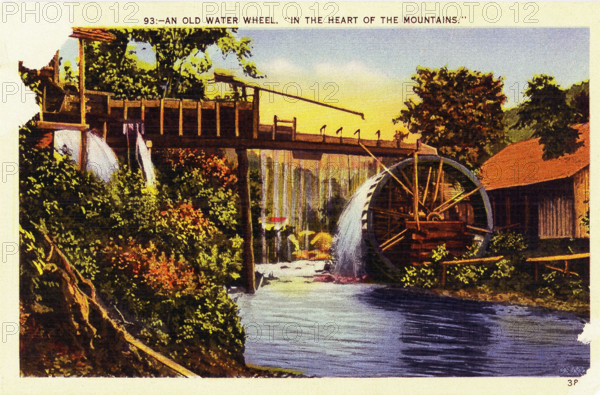 Pictured in this early 1930s postcard is an old water wheel in the ""heart of the mountains"" in North Carolina, in along the eastern coastline of the southern United States.