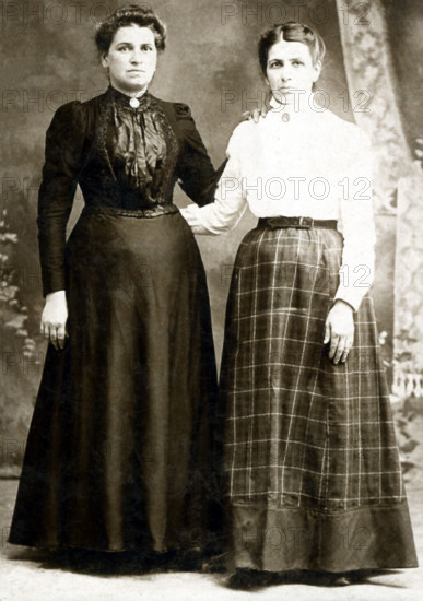 Two Women in Long Dresses