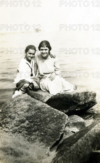 Woman and Girl on Rocks