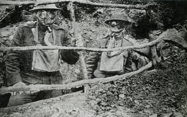 This photo, dating to before 1922, relates to World War I. The caption reads: Marines awaiting a gas attack. The U.S. Marines were nicknamed Teufle Hunden, or Devil Dogs.