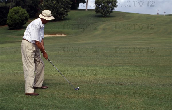 BERMUDA, People, Sport, Man playing golf on the Mid-Ocean Golf Course