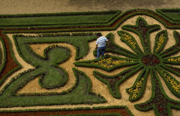 FRANCE,  , Angers, Chateau Moat Garden with gardener