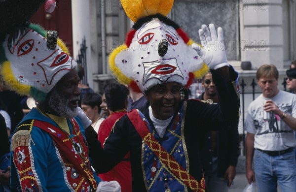ENGLAND, London, People in clown costumes at the Notting Hill carnival
