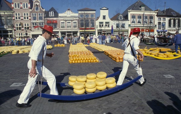 HOLLAND, Noord Holland, Alkmaar, Cheese carriers at the friday cheese market in Waagplein Square