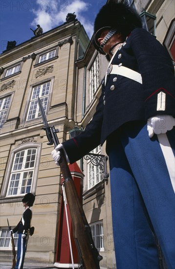 DENMARK, Copenhagen, Amalienborg Palace, Royal guards with bayonet rifels standing outside the palace