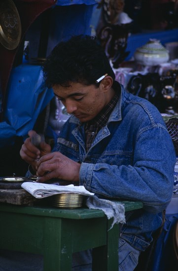 TUNISIA, Kairouan, Engraver at work in the medina