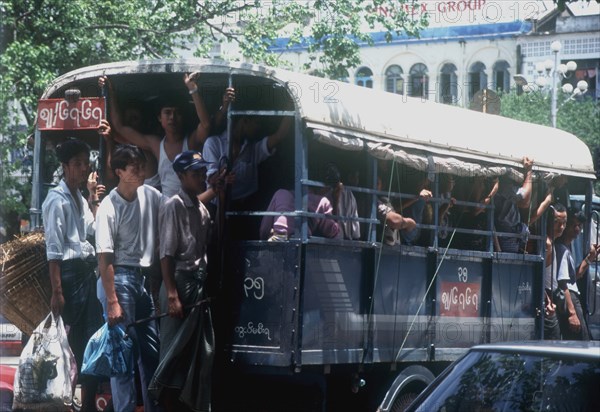 MYANMAR, Yangon, Crowded public bus.