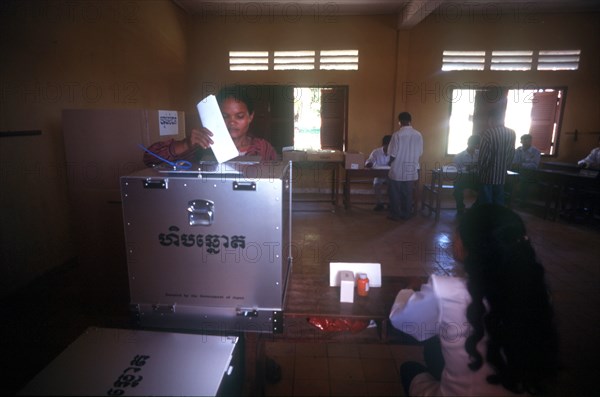 CAMBODIA,  , Politics, Woman voting in a polling station durin elections in rural area along Route 10.
