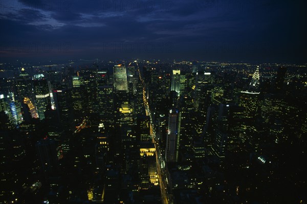 USA, New York , New York City, View over Mid Manhattan and the Chrysler building illuminated at night