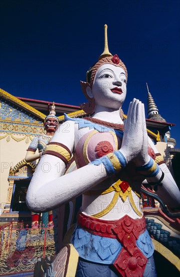 MALAYSIA, Penang, Georgetown, "Wat Chayamangkalaram.  Exterior, temple statues."