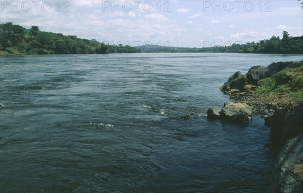 UGANDA, Jinga River, View down river bridge in distance Source of the Nile