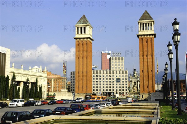 SPAIN, Catalonia, Barcelona, Placa d Espanya. View of the two 154ft high brick campaniles by Ramon Raventos.