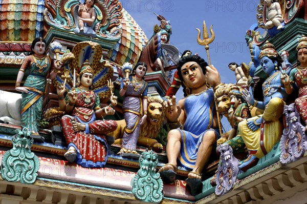 SINGAPORE, Central, Chinatown, Sri Mariamman Temple. Detail of brightly coloured Hindu carvings dating from 1862