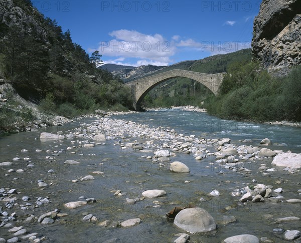 FRANCE, Provence Cote d Azur, Alpes de Haute Provence, Coulomp River with the Pont de la Reine Jeanne bridge