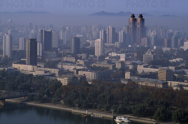 NORTH KOREA, Pyongyang, Cityscape with the Koryo Hotel twin towers amongst other skyscrapers.