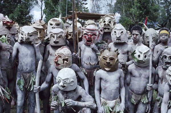 PAPUA NEW GUINEA, Goroka, Asaro mudmen at Goroka Cultural Show.