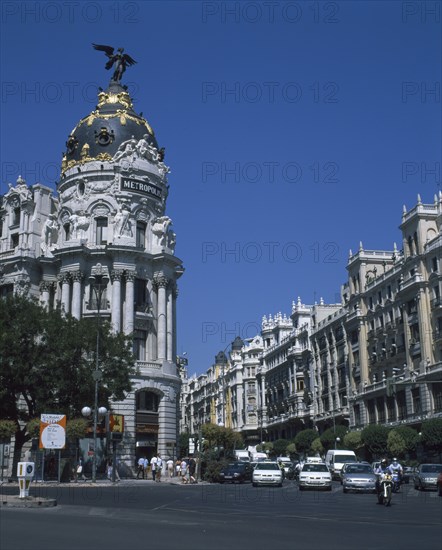 SPAIN, Madrid State, Madrid, Alcala Grand Via Junction. View over road and traffic towards the Metropolis building.