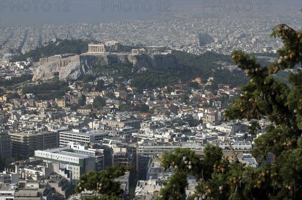GREECE, Athens, Aerial view over the city toward the Acropolis