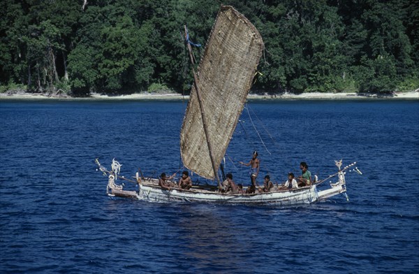 PACIFIC ISLANDS, Melanesia, Papua New Guinea, Marshall Bennett Islands.Gawa Island. Local outrigger boat