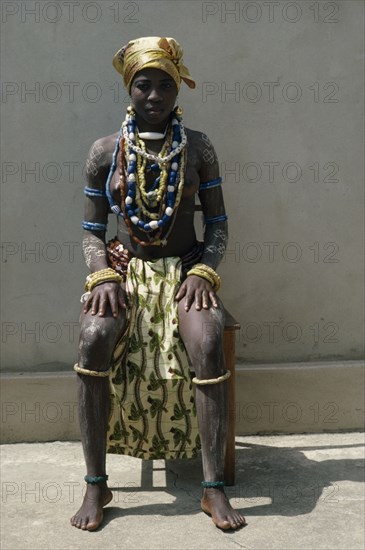 GHANA, Tribal People, Fante girl at dipa initiation ceremony held at onset of menstruation.  Every girl receives gifts of jewellery at puberty.