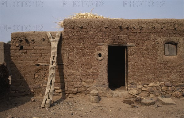 MALI, Housing, Mud brick village home.