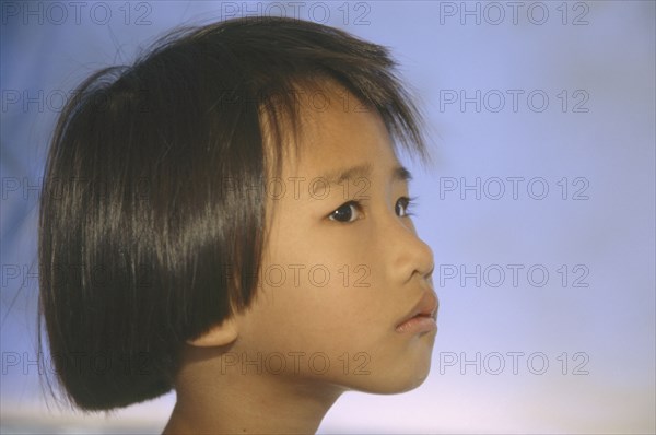 THAILAND, Khao Lak , Portrait of a Tsunami orphan.