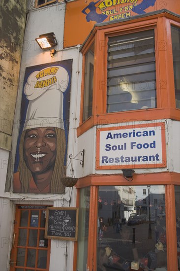 ENGLAND, East Sussex, Brighton, Momma Cherrys Soul Food Restaurant frontage.