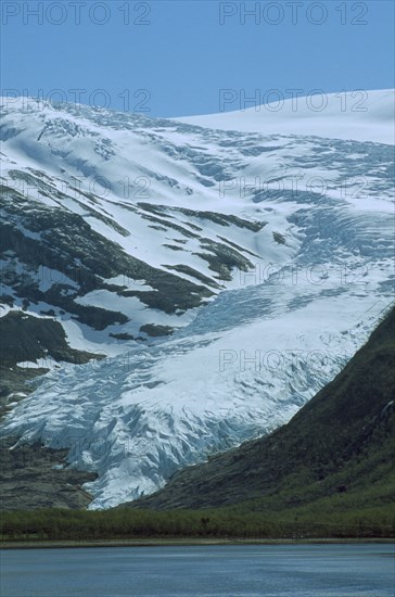 NORWAY, Svartisen Glacier, Rocky coastline.