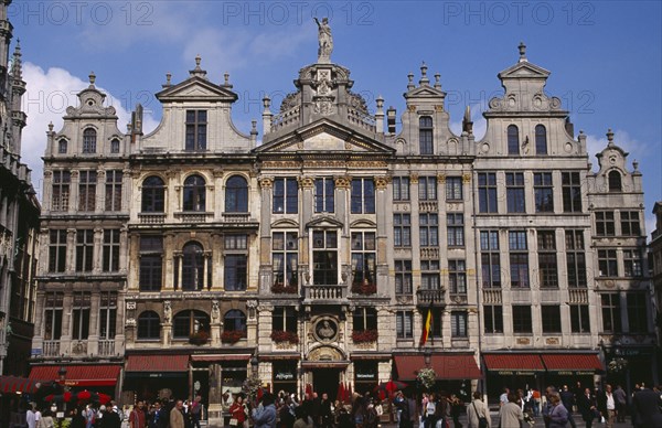 BELGIUM, Brabant, Brussels, Grand Place.  Crowds in front of old town buildings and cafes. UNESCO World Heritage Site