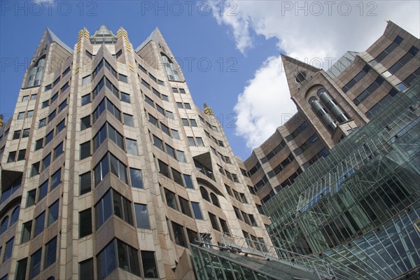 ENGLAND, London, Facade of modern building in the City with glass conservatory or atrium on the front entrance.