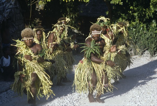 PACIFIC ISLANDS, Melanesia, Solomon Islands, "Malaita Province, Lau Lagoon, Foueda Island.  Men in traditional costume performing dance."