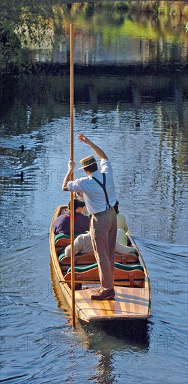 NEW ZEALAND, SOUTH ISLAND, CHRISTCHURCH, "CANTERBURY, TOURISTS BEING PUNTED ALONG THE RIVER AVON IN CHRISTCHURCH."