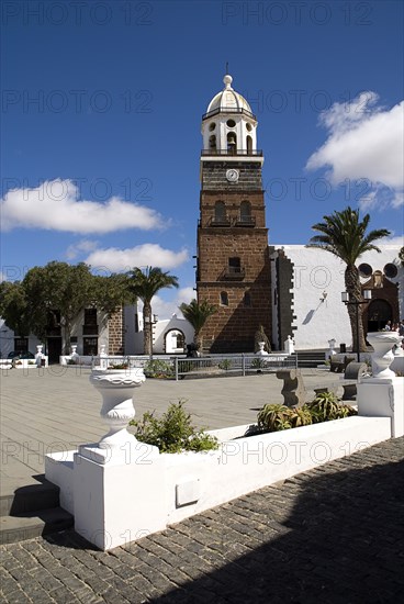 SPAIN, Canary  Islands, Lanzarote, "Tequise, the former capital.  Church of Nuestra Senora de Guadalupe also known as Iglesia de  San Miguel fronted by Plaza de la Constitucion, the main square."