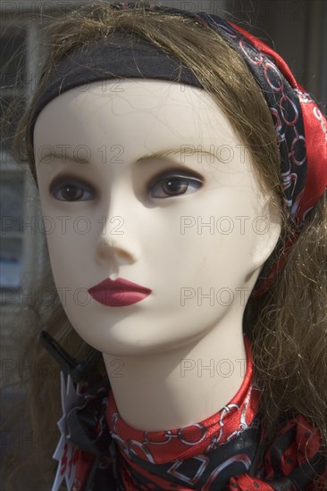 ENGLAND, West Sussex, Shoreham-by-Sea, Manekin head on dispaly during Feench market in the East Street.