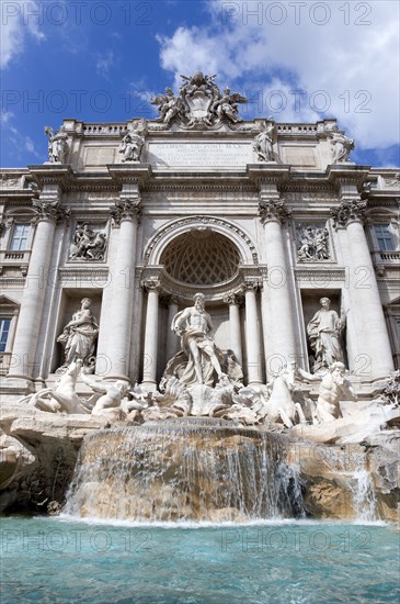 ITALY, Lazio, Rome, The 1762 Trevi Fountain by Nicola Salvi with a statue of the god Neptune in the middle