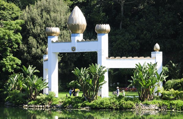 USA, California, Los Angeles, "View across lake to Golden Lotus Archway, Self Realization Lake Shrine, Pacific Palisades"