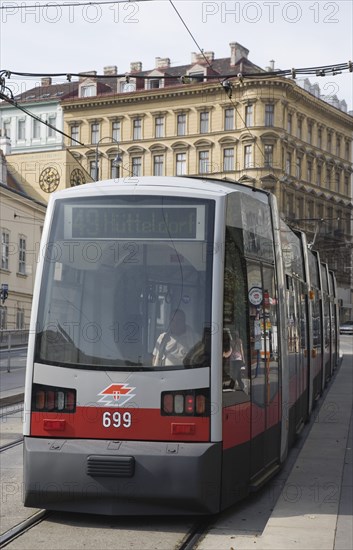 Vienna, Austria. Neubau District. The latest model of Wiener Linien tram at the Volkstheater. Austria Austrian Republic Vienna Viennese Wien Europe European City Capital Neubau District Transport tram Urban Wiener Linien Volkstheater Destination Destinations Osterreich Viena Western Europe