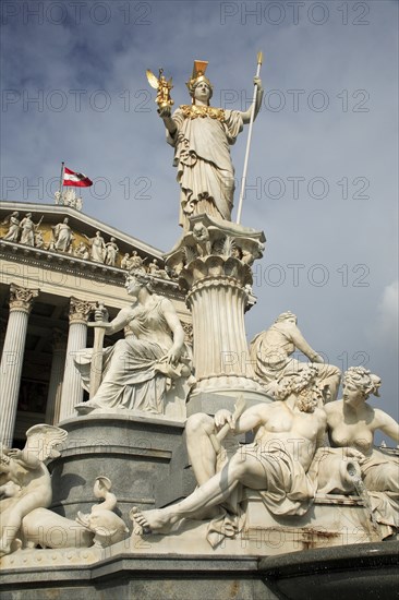 Statue of Athena raised on pillar above fountain in front of the Parliament building. Photo : Bennett Dean