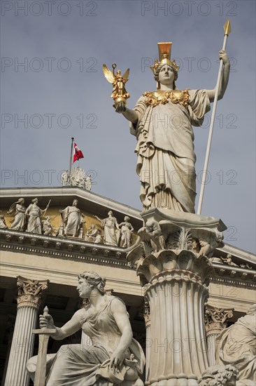 Statue of Athena raised on pillar above fountain in front of the Parliament building. Photo : Bennett Dean