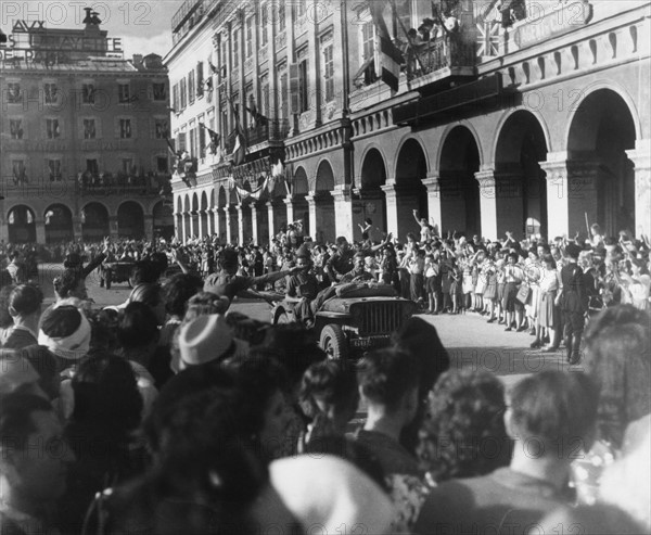 Allied troops parading on the Rue de Rivoli, during the Liberation of Paris (August 1944)